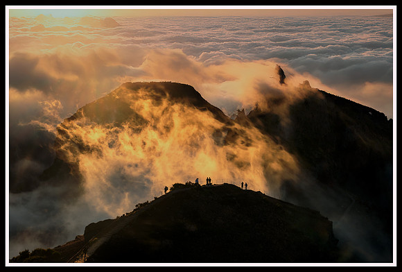 Silhouettes Above the Clouds