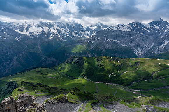 Beyond the Lush Green Valley lies the Majestic Mountains