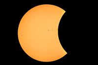 Moon Eclipsing the Spotted Sun