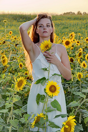 Girl in sunflower field