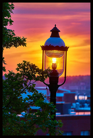 Sun lit street light