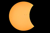 Moon Eclipsing the Spotted Sun